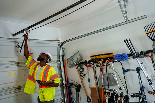 Professional Garage Door Panel Replacement technician working in Atlantic Beach, NC